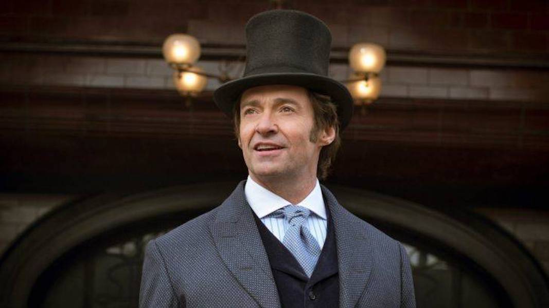 Hugh Jackman wears a top hat during a scene fromThe Greatest Showman