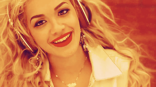 Rita Ora wearing headphones