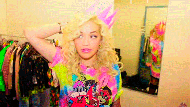 Rita Ora wears a party hat