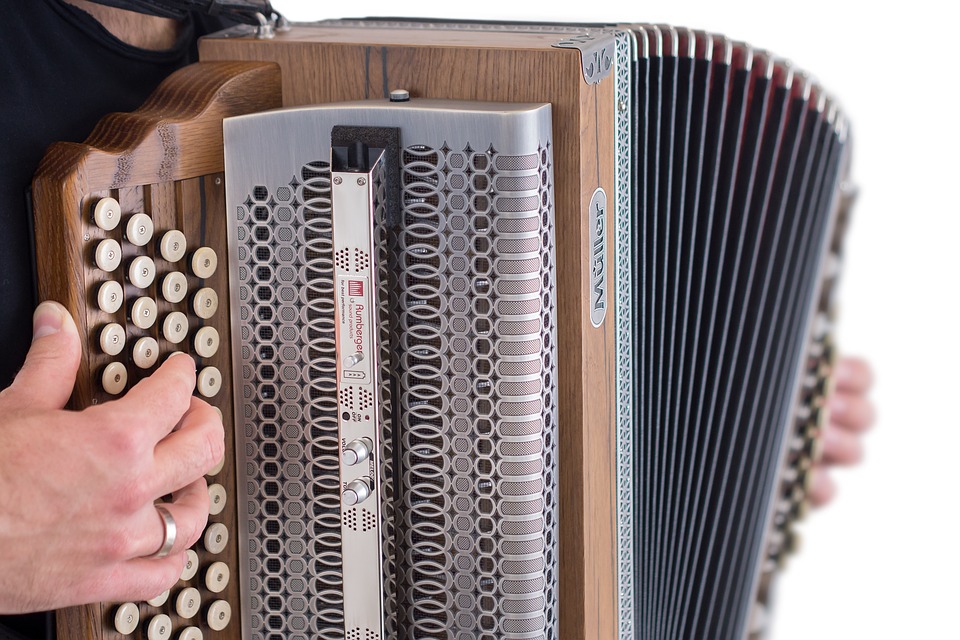 A man playing the accordion