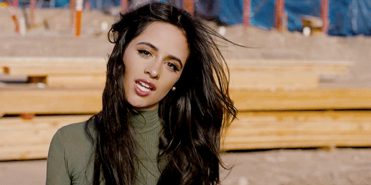 Camila Cabello performs in a music video