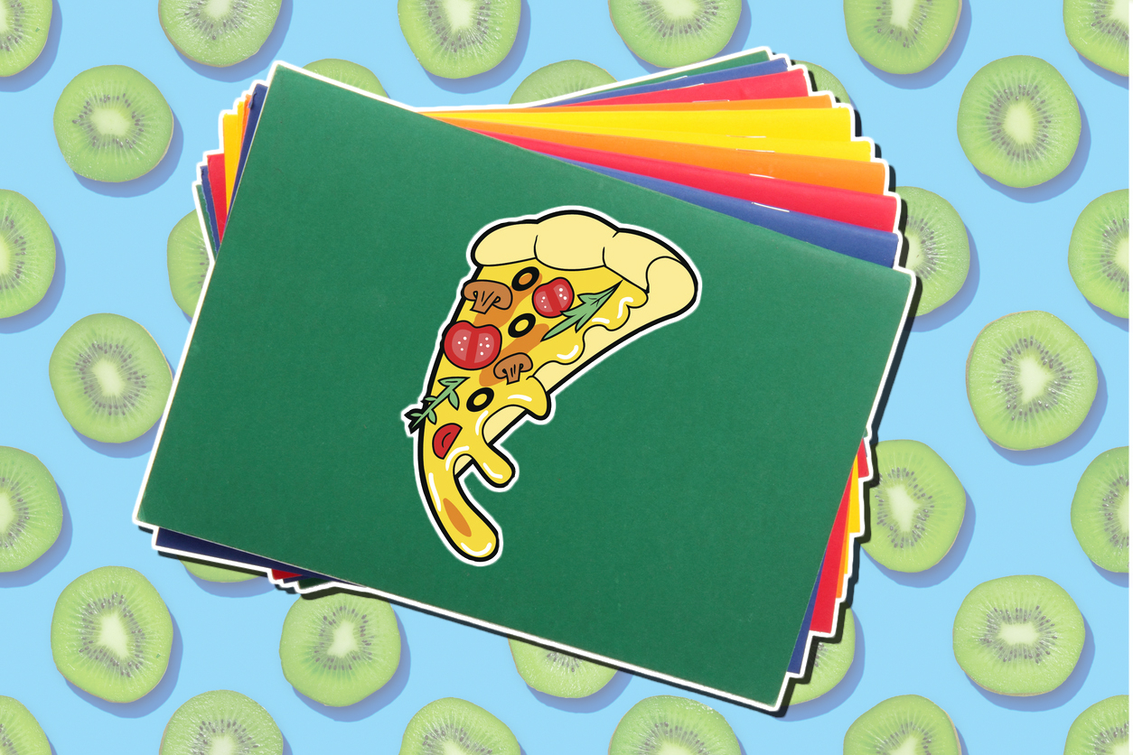 A pizza slice sticker on a school book
