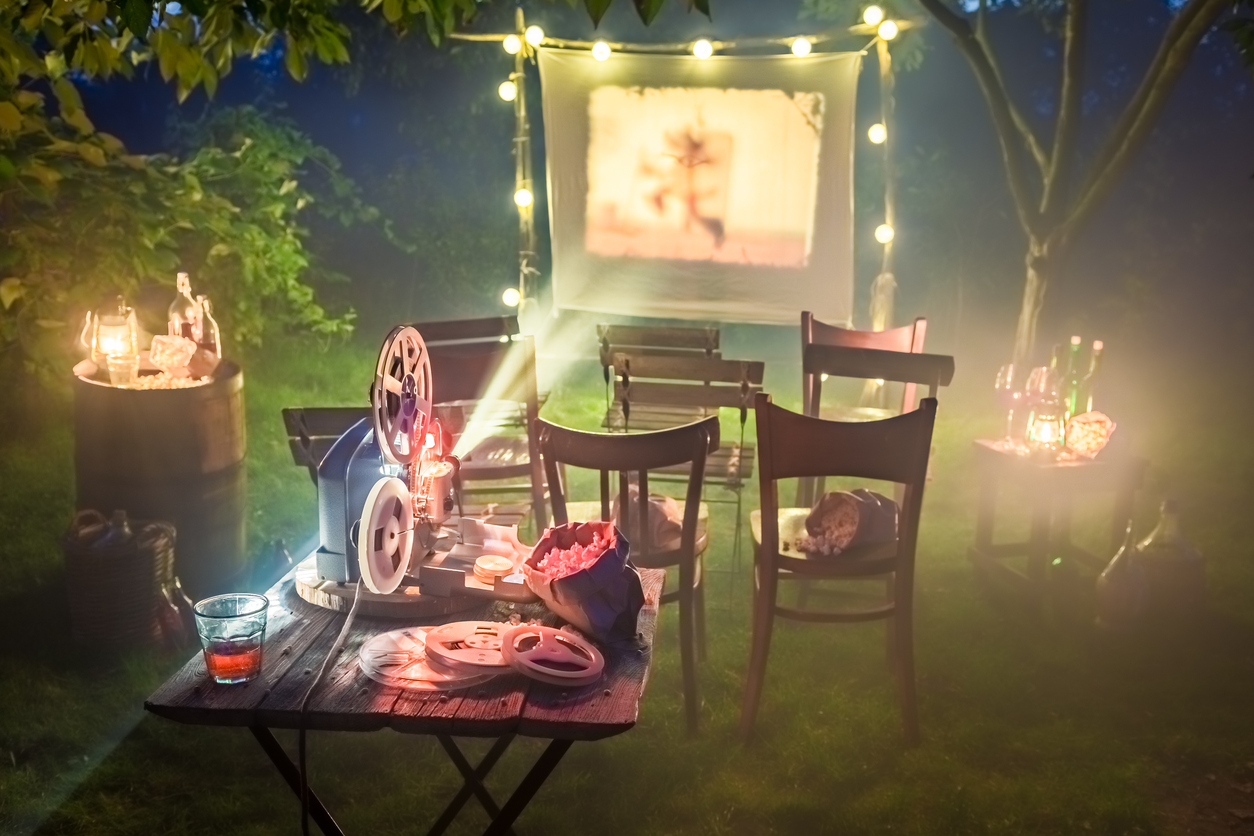 A home cinema in a candlelit garden 