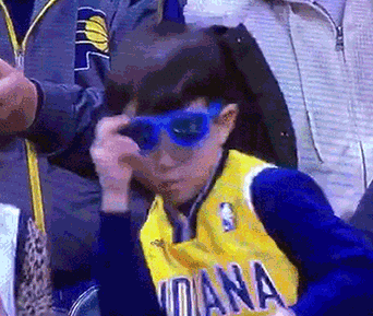 A confident kid has a great time at the basketball game