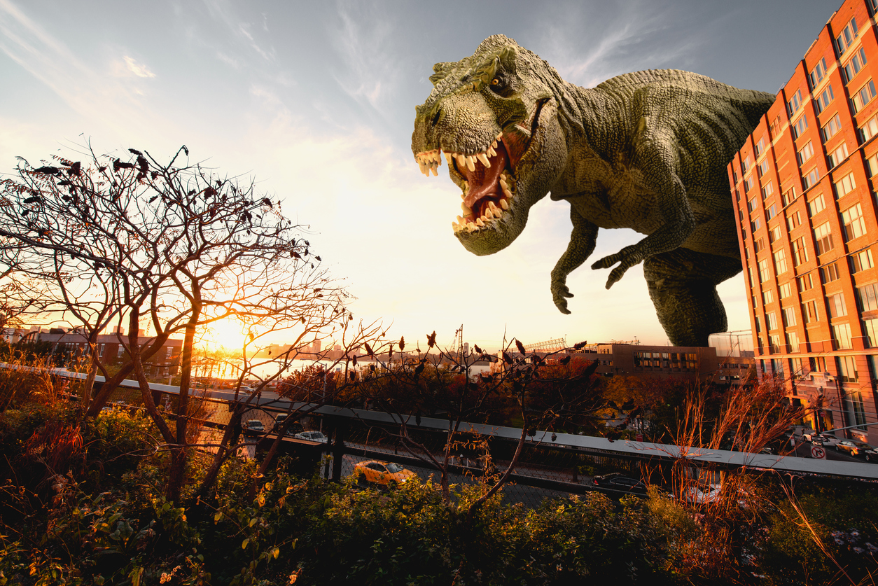 A Tyrannosaurus rex menacing the countryside