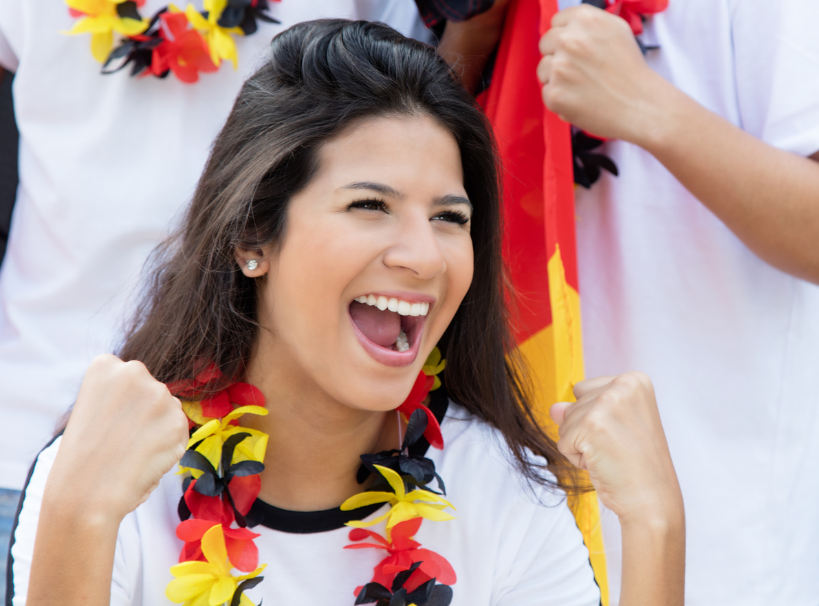 A happy German soccer fan at stadium 