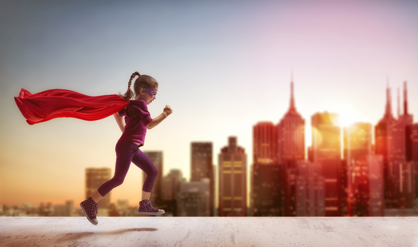 A young superhero dashing across the city