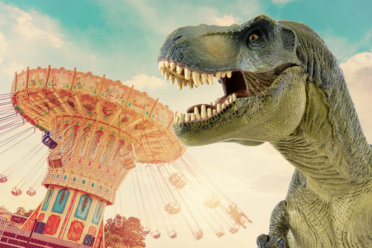 A dinosaur visiting a fairground