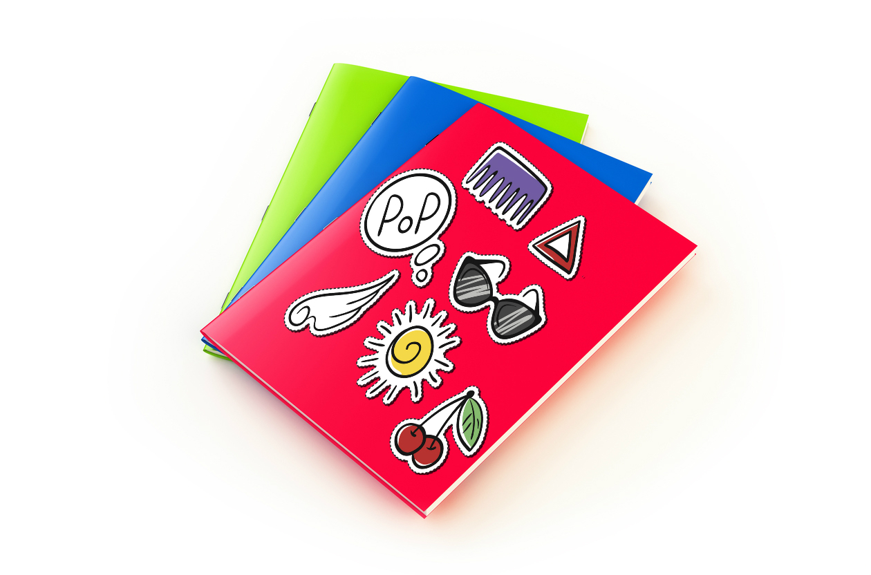 An exercise book covered in stickers