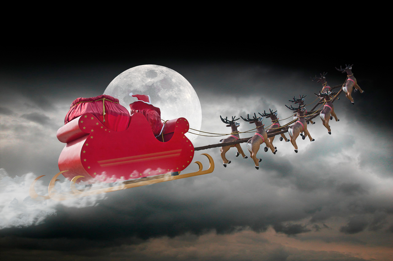 Santa zooms past in his sleigh