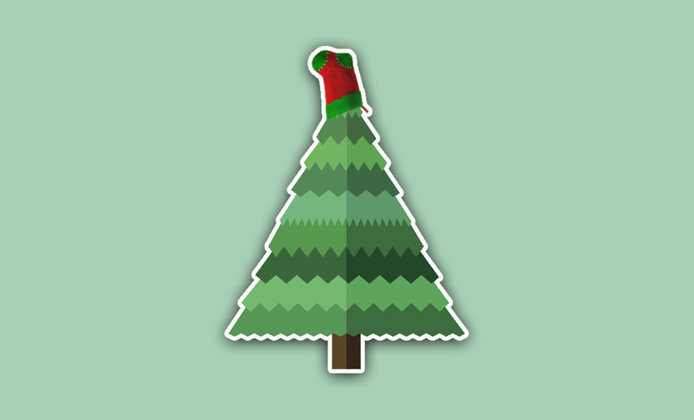 A Christmas tree with a sock stuck on top