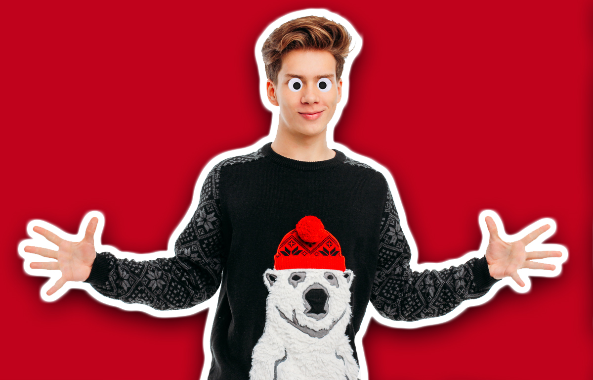 A man wearing an awesome Christmas jumper