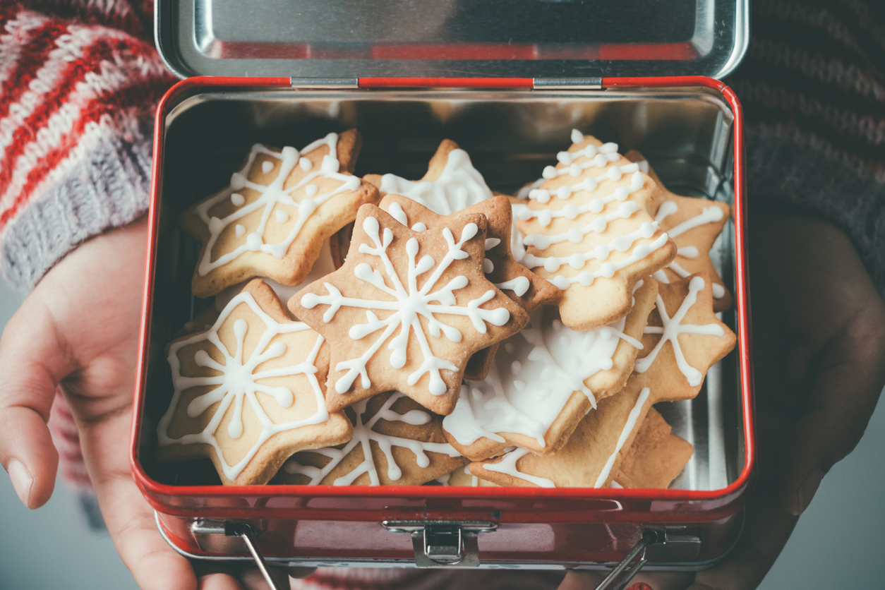 A tin of snowflake-shaped biscuits 
