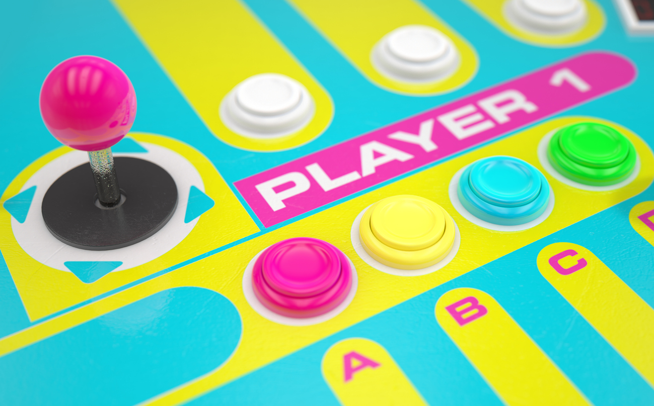 An colourful arcade joystick and buttons