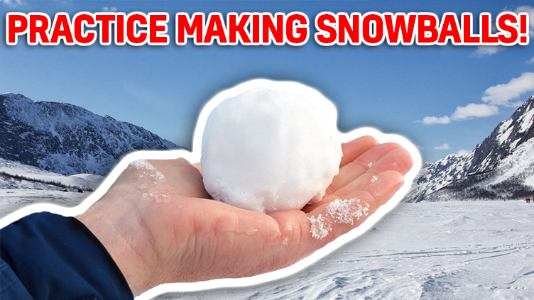 A picture of someone holding a perfect snowball!