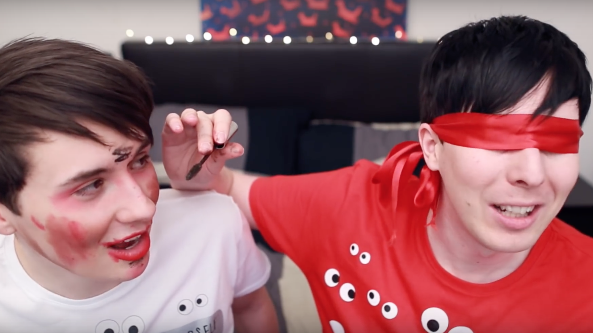 Dan and Phil do the blindfolded make-up challenge