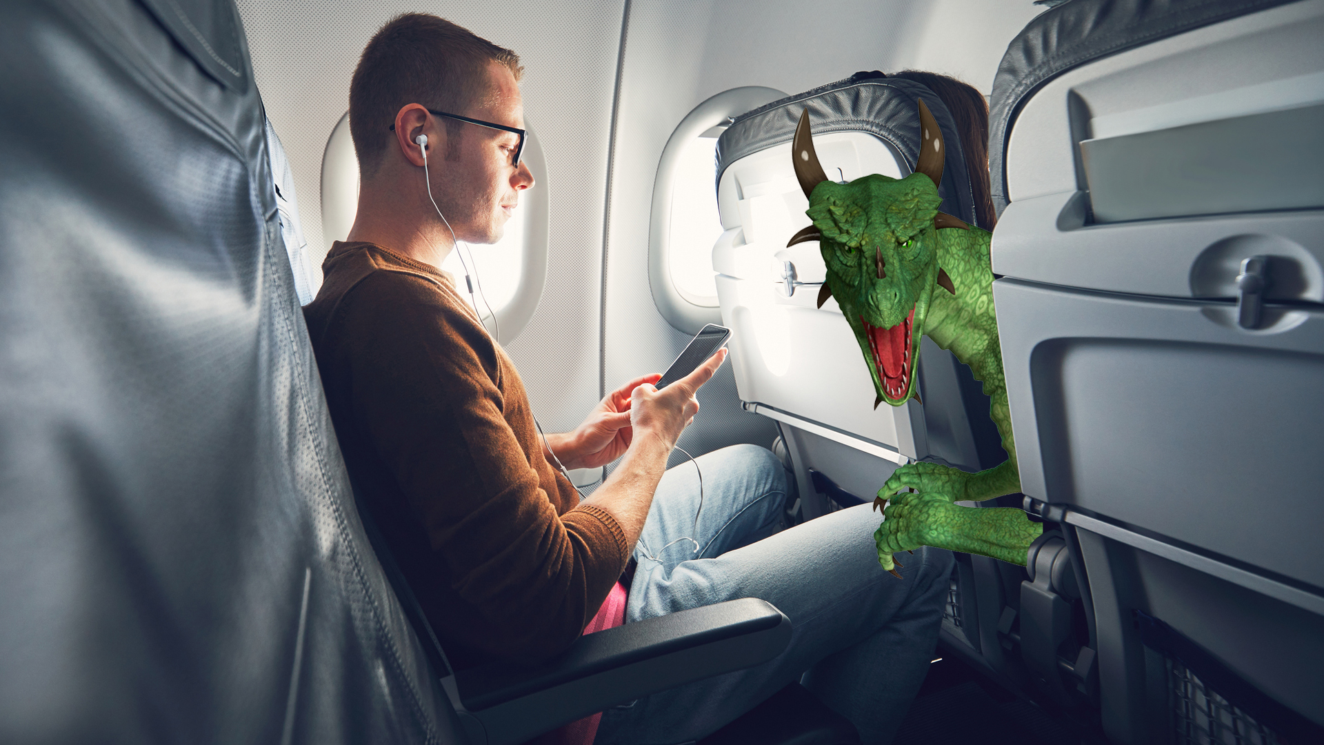 A dragon enjoying a flight on an aeroplane 