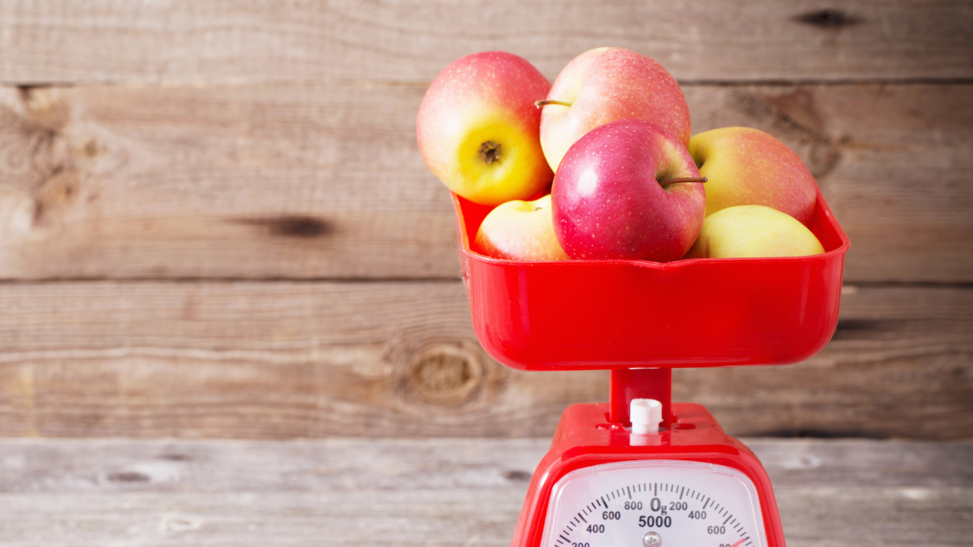 Kitchen scales weighing some apples