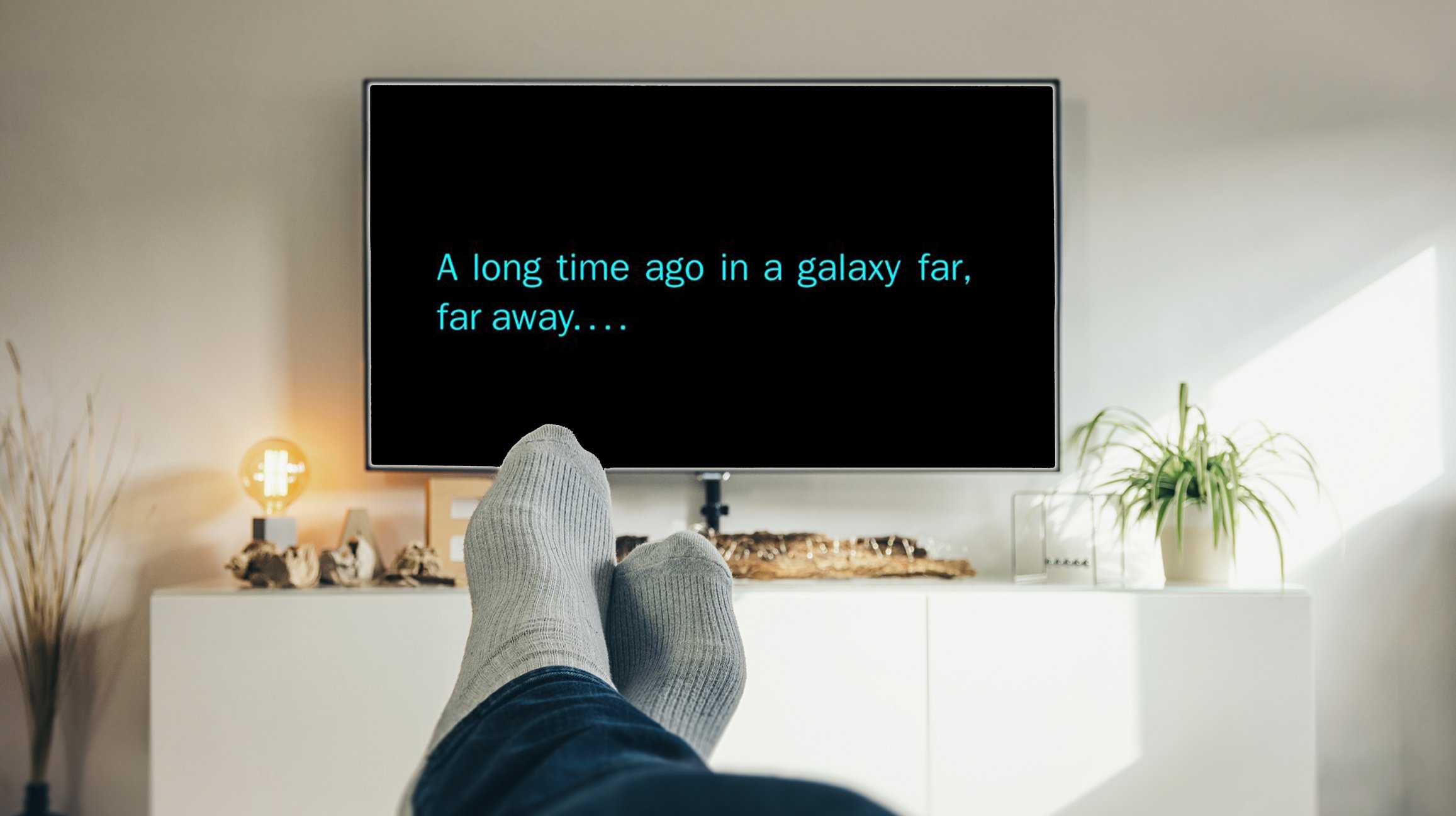 A person relaxing watching a Star Wars movie