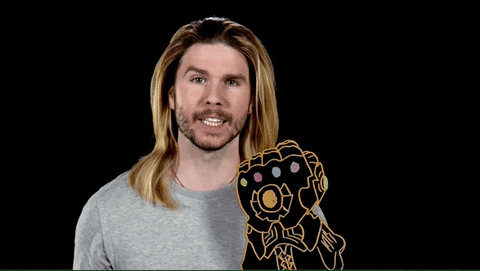 A young man wearing an Infinity Gauntlet