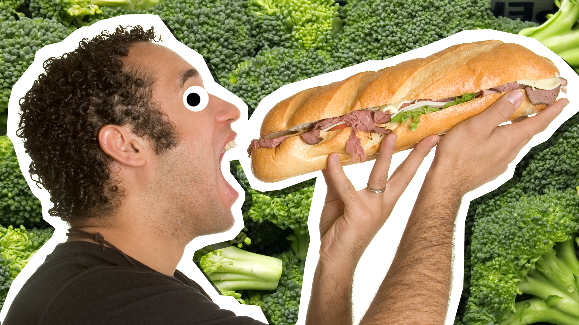 A man eating a massive sandwich