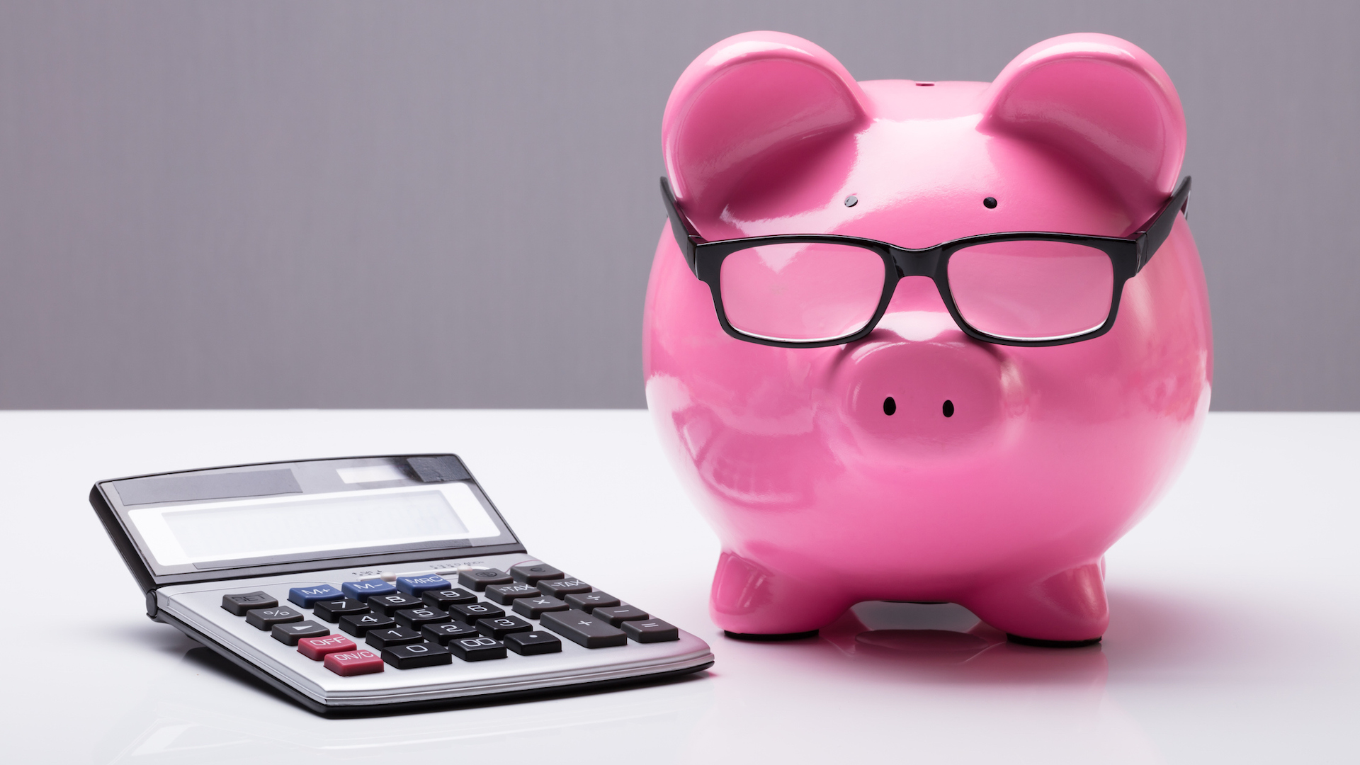 A piggy bank and calculator 