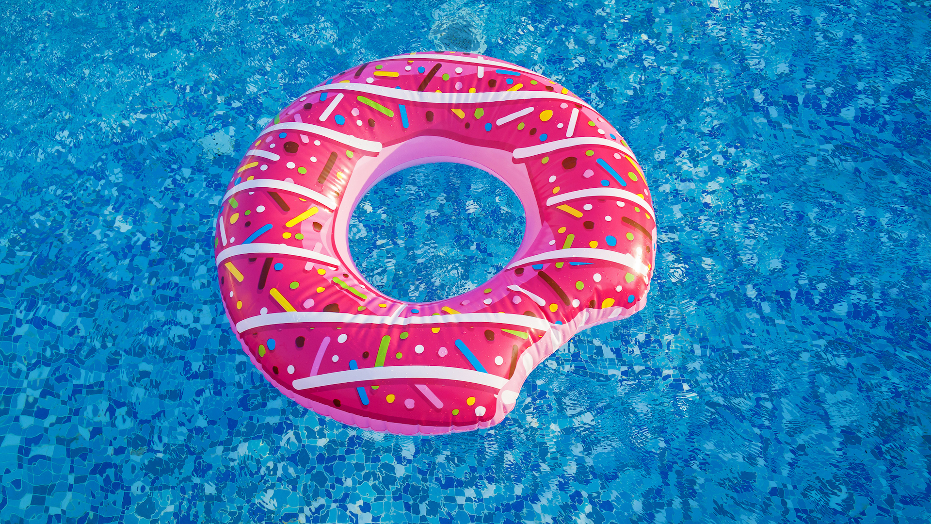 A pool float in the shape of a donut