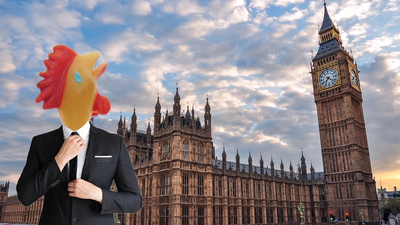 A rubber chicken pretending to be a politician outside the Houses of Parliament