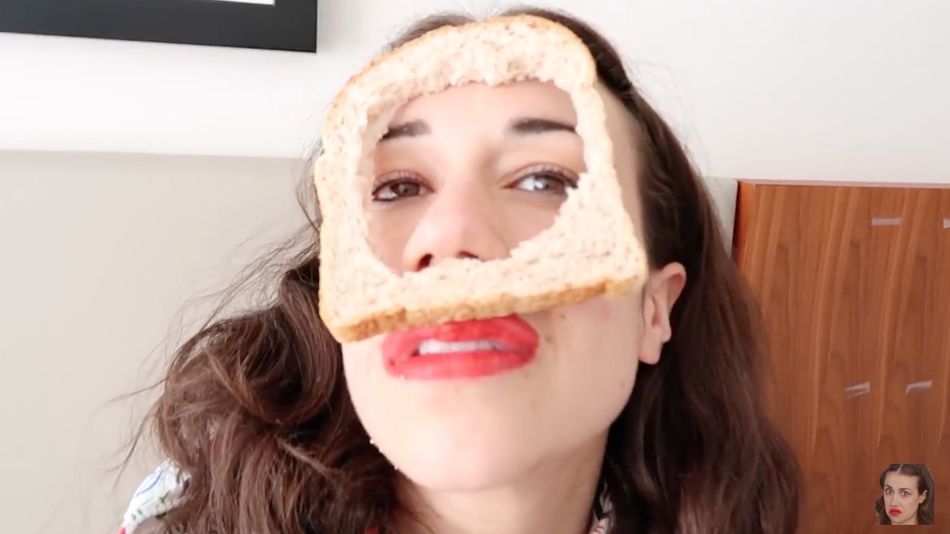 Miranda Sings with a slice of bread on her face