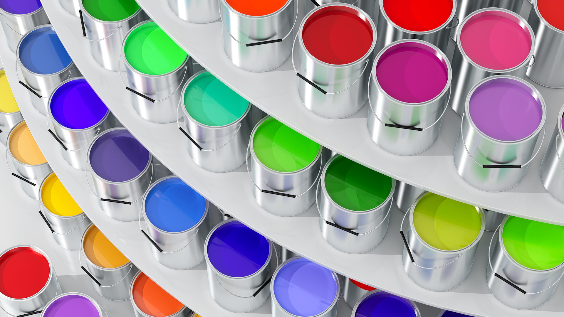 Coloured paints arranged on a shelves