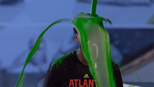 An Atlanta Hawks player getting soaked in slime