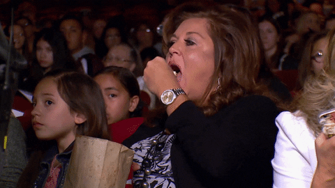 A Dance Mom star eats popcorn at the cinema