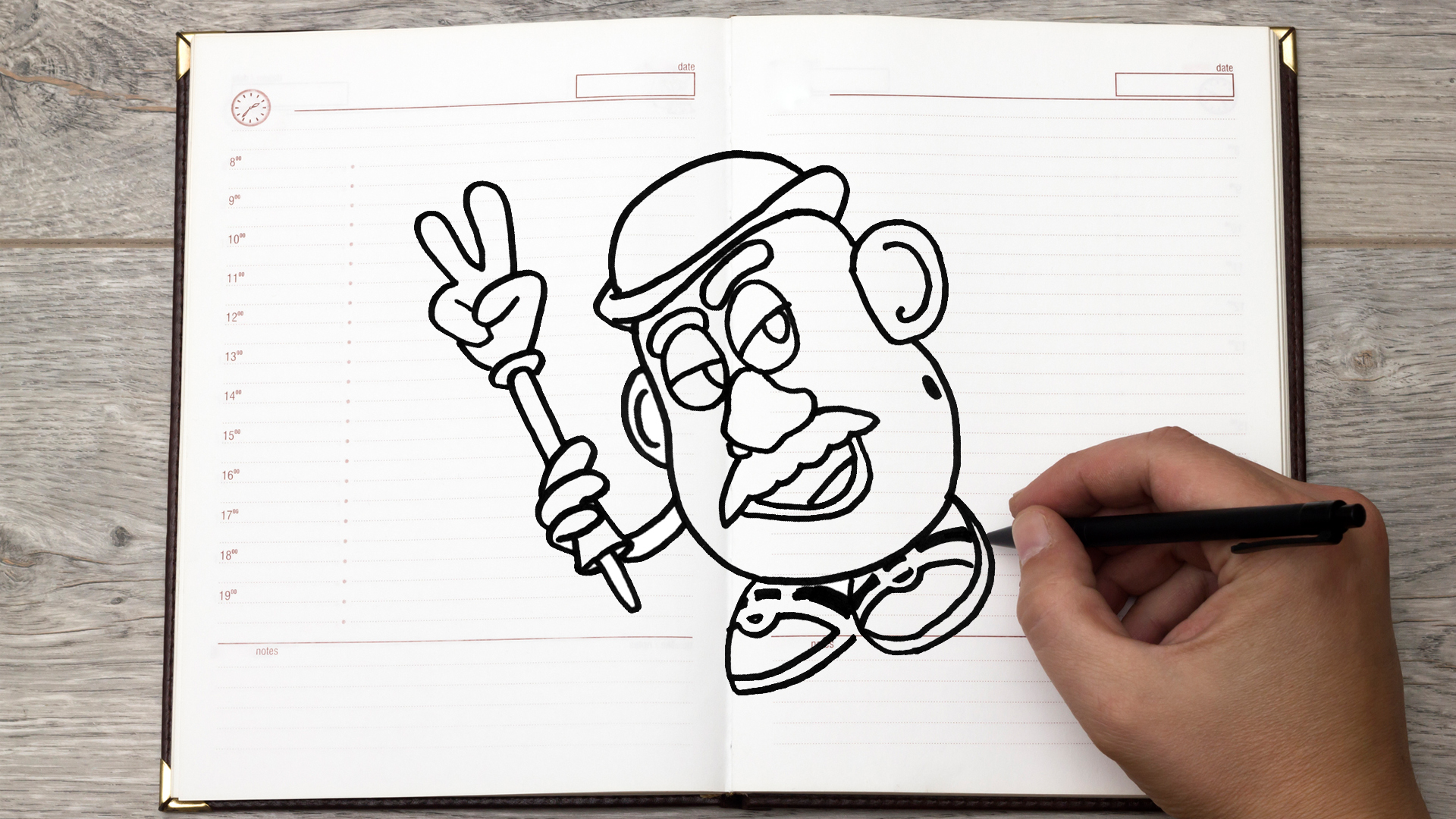 A doodle of Mr. Potato Head in a diary