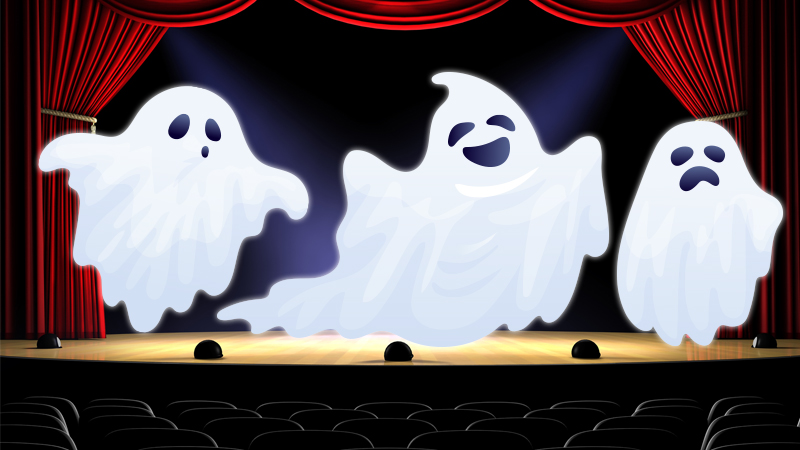 Three white ghosts on a stage