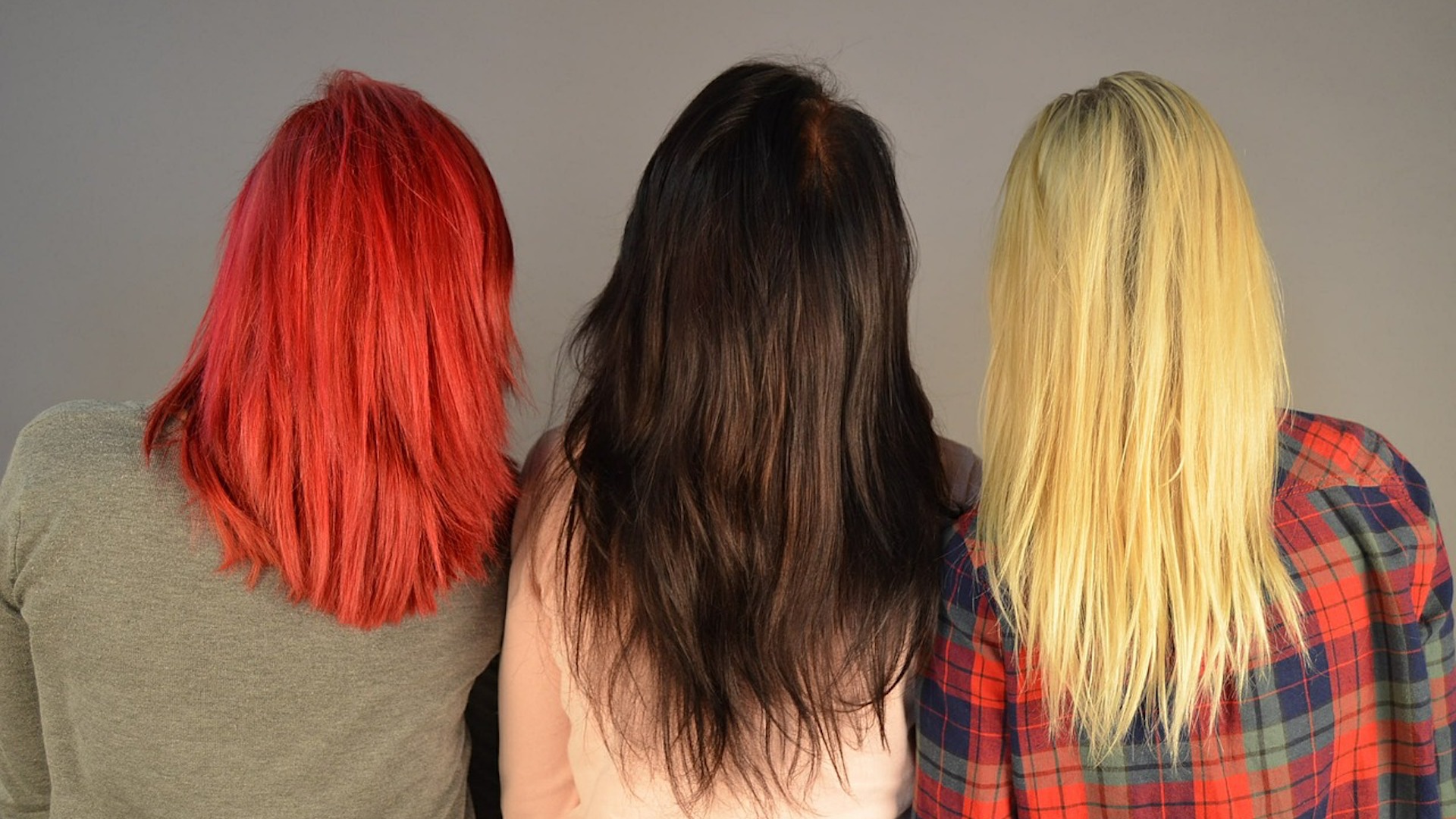 Three people with different coloured hair