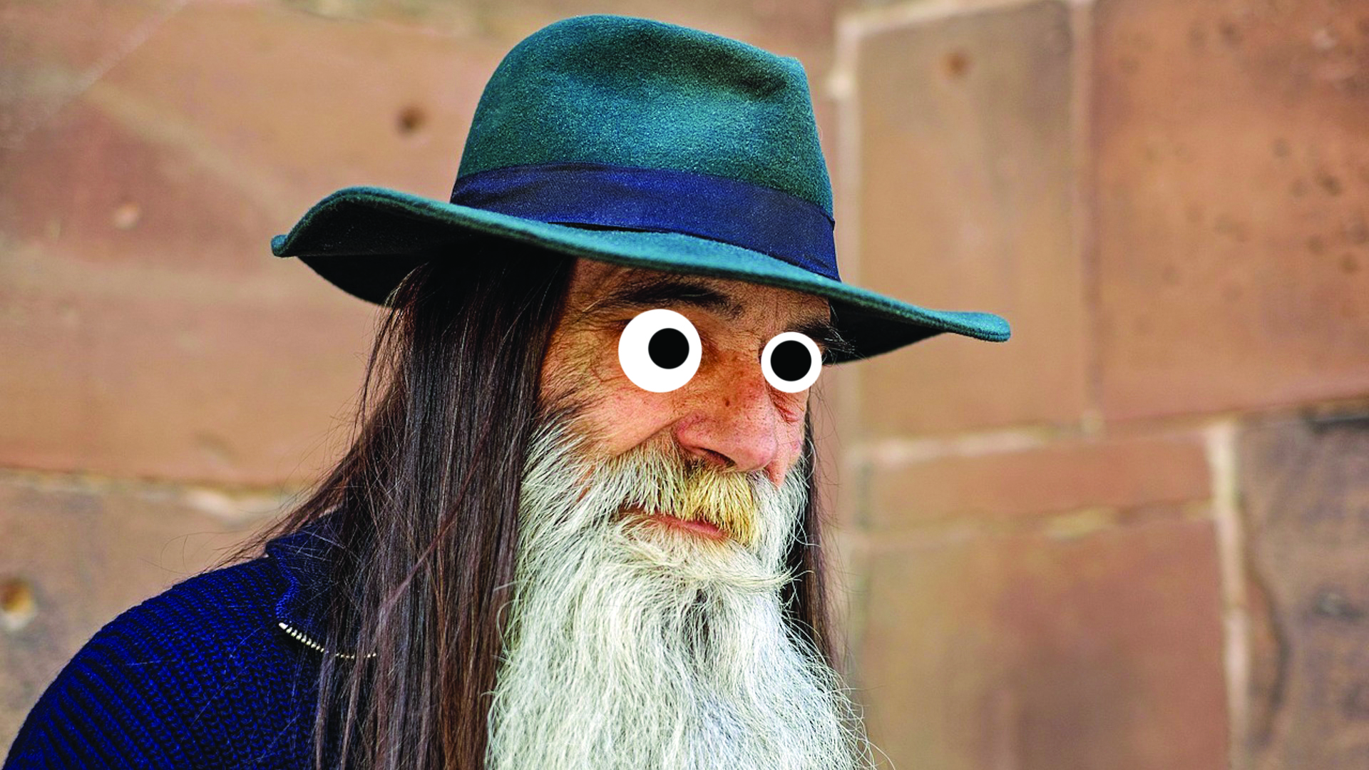 A beardy man wearing a hat