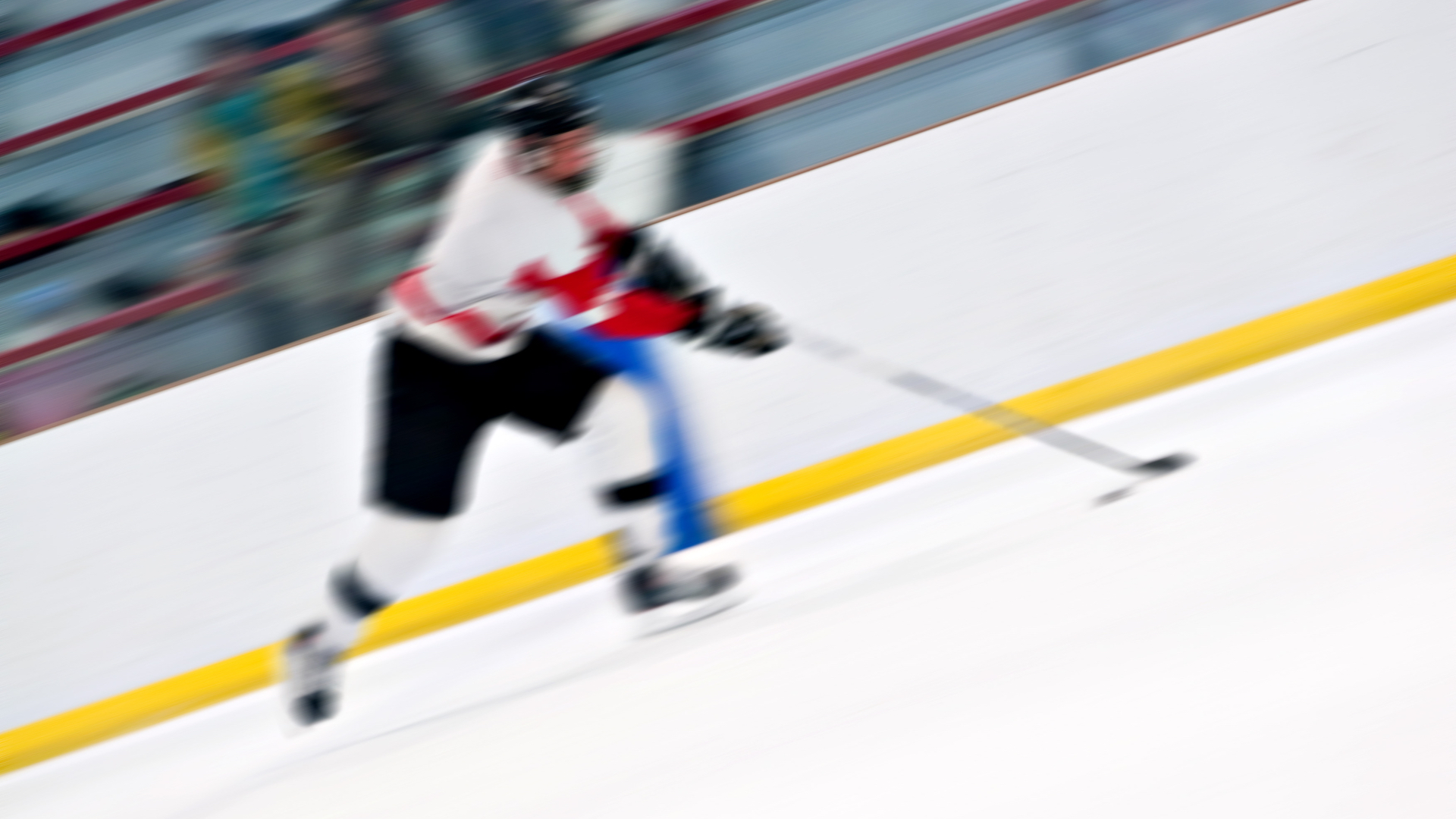 An action shot of an ice hockey player