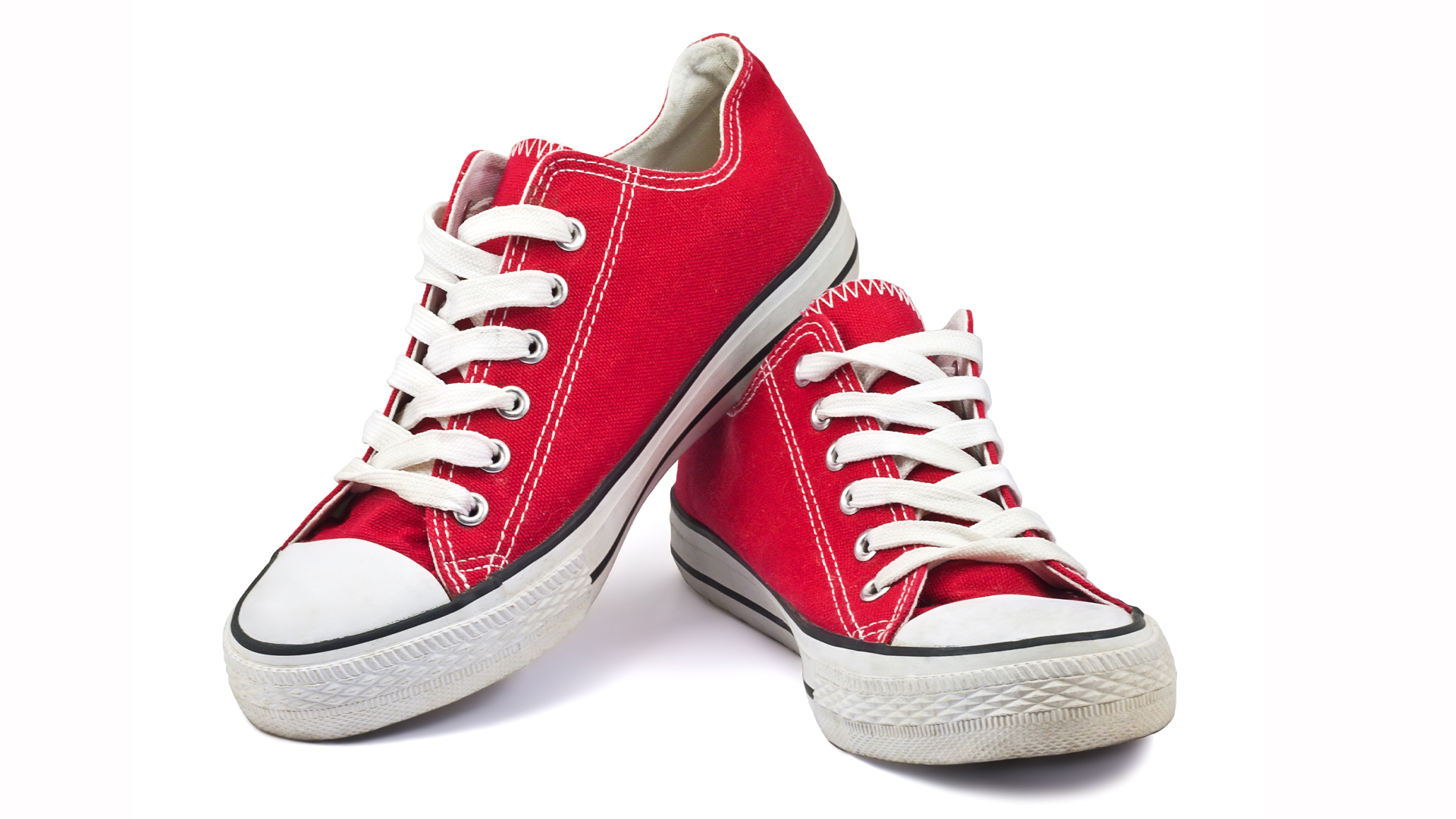 A pair of red Converse style trainers