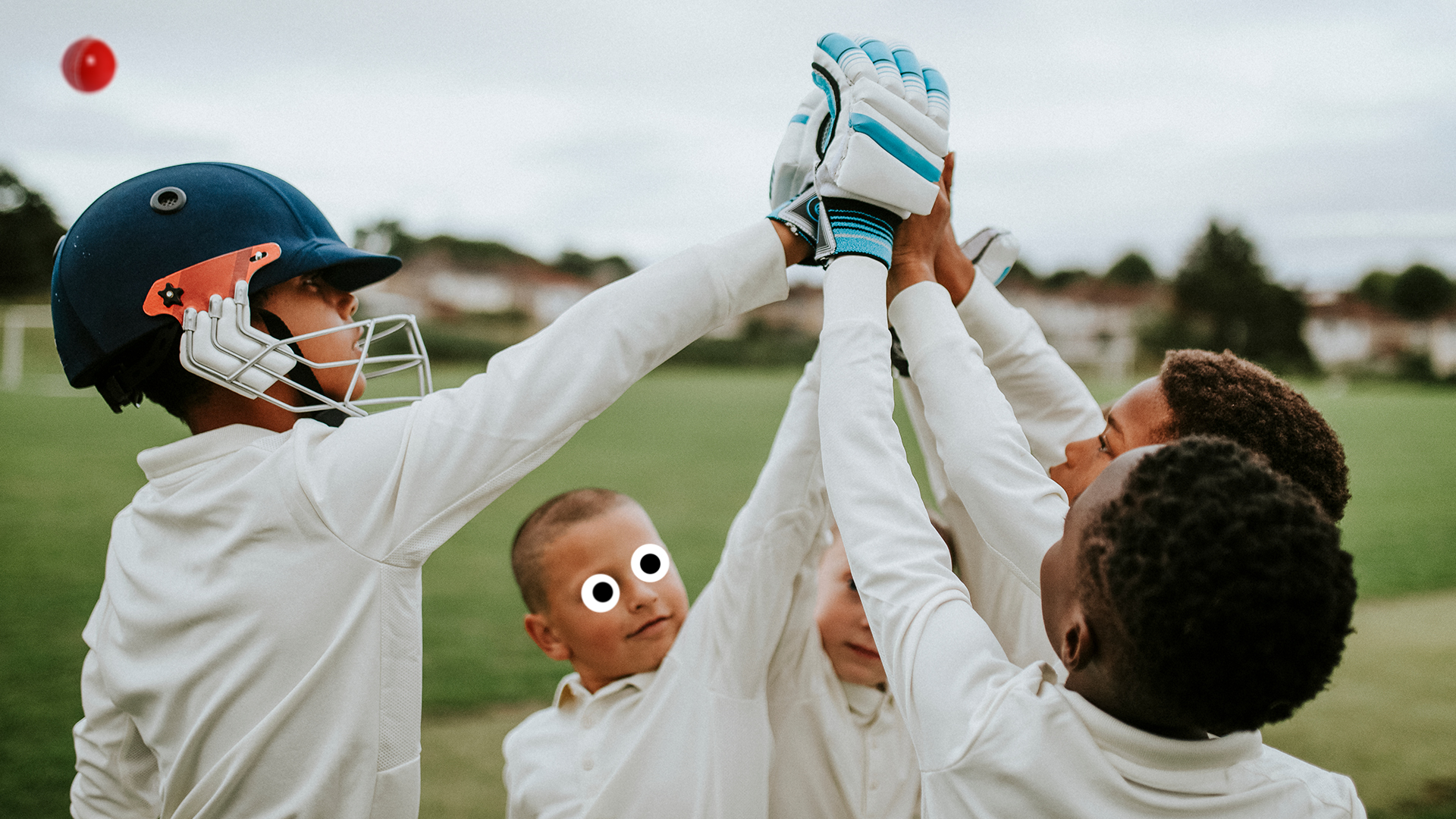 A young cricket team celebrate a win