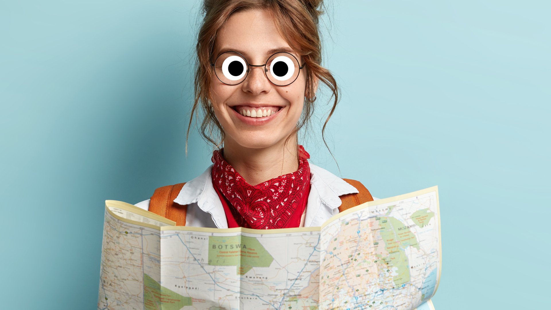A woman holding a map