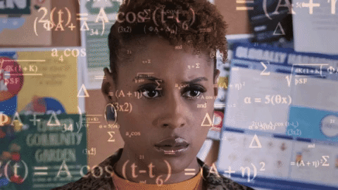 A woman calculating a maths problem