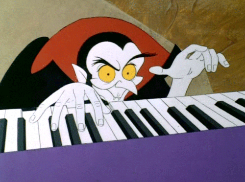 A vampire playing the piano