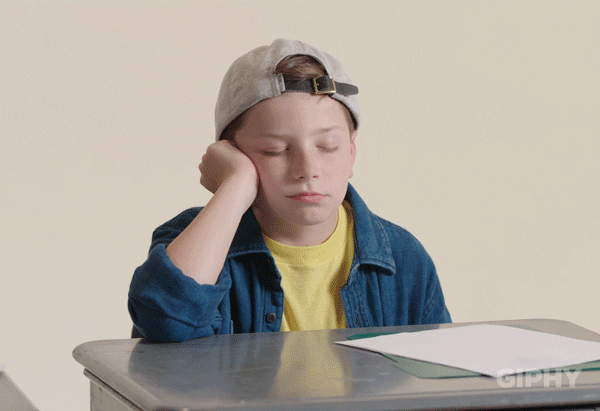A student falling asleep at their desk
