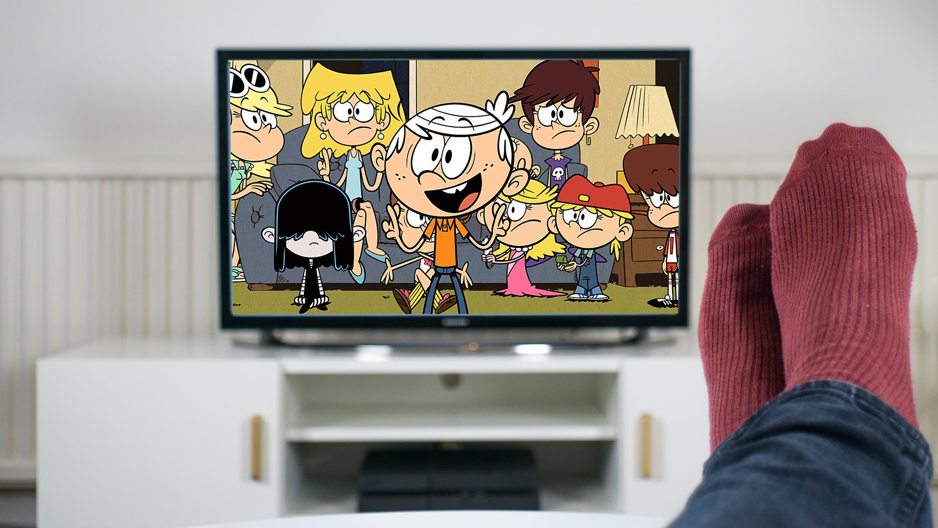 Person with feet up watching The Loud House