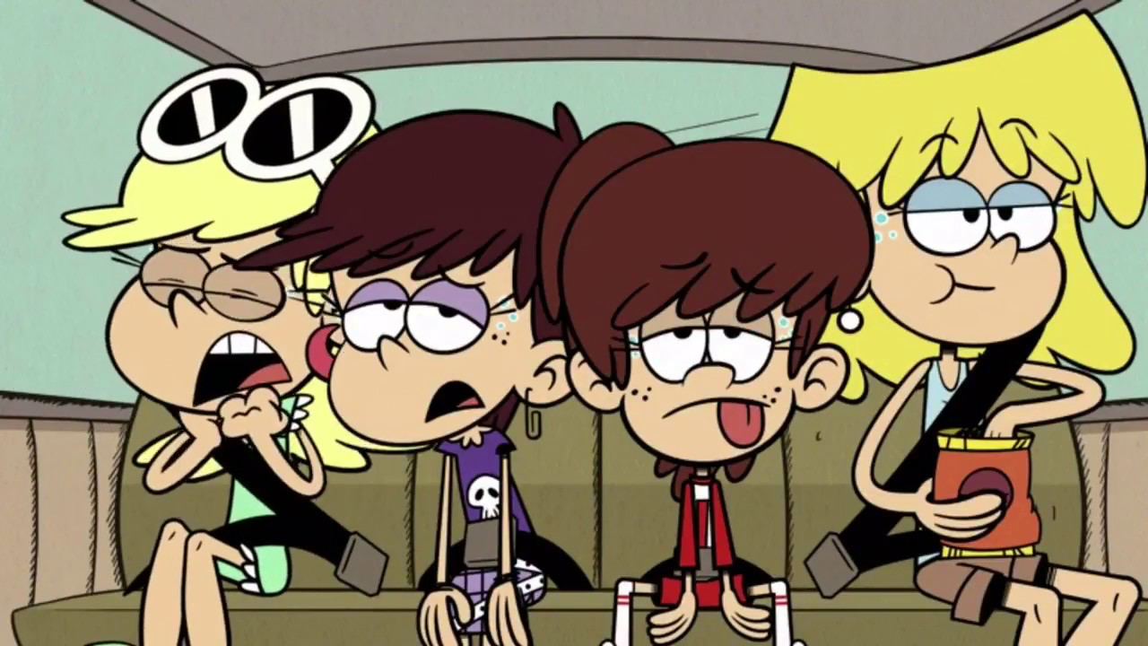The Loud House sisters sitting in the back of a car