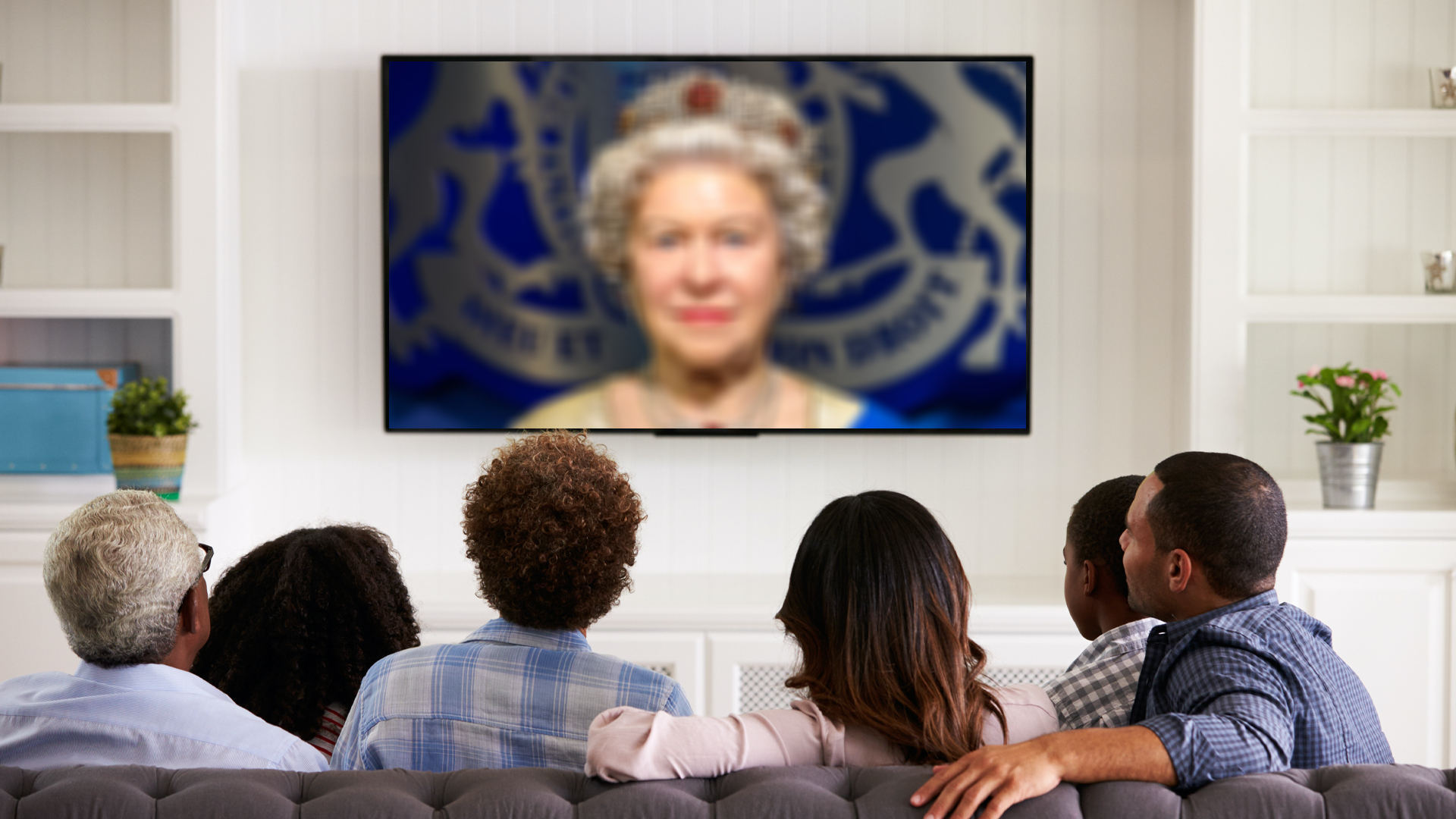 A family watching the Queen's speech on TV