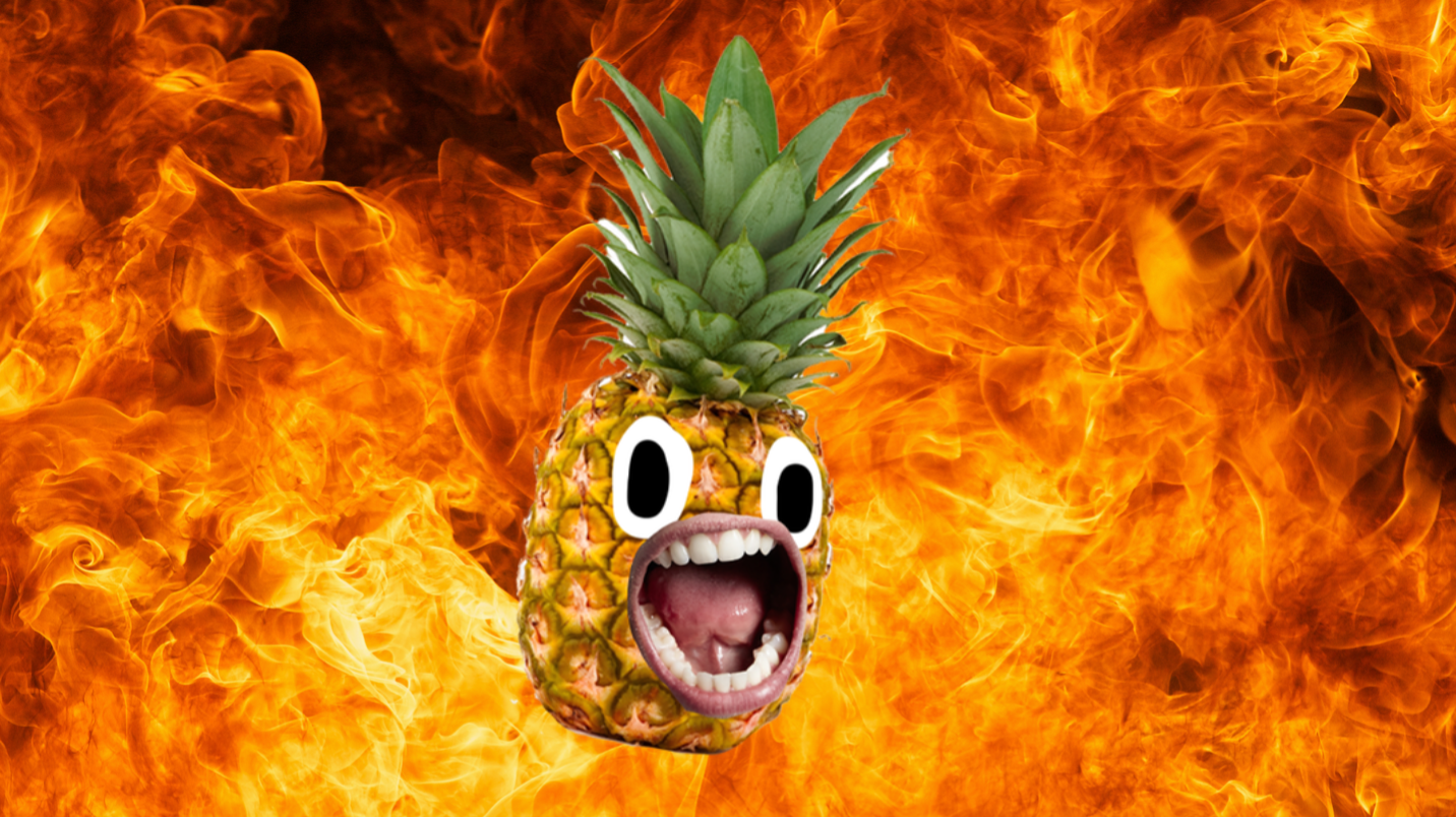 A pineapple in front of a fiery background 