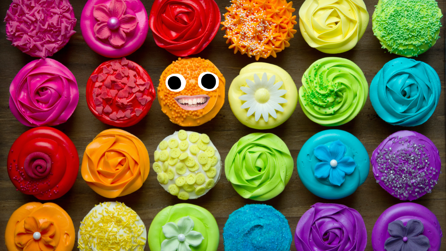 Rainbow coloured cupcakes