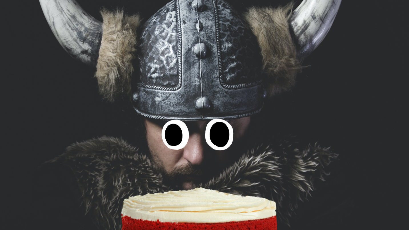 A viking about to eat a cake