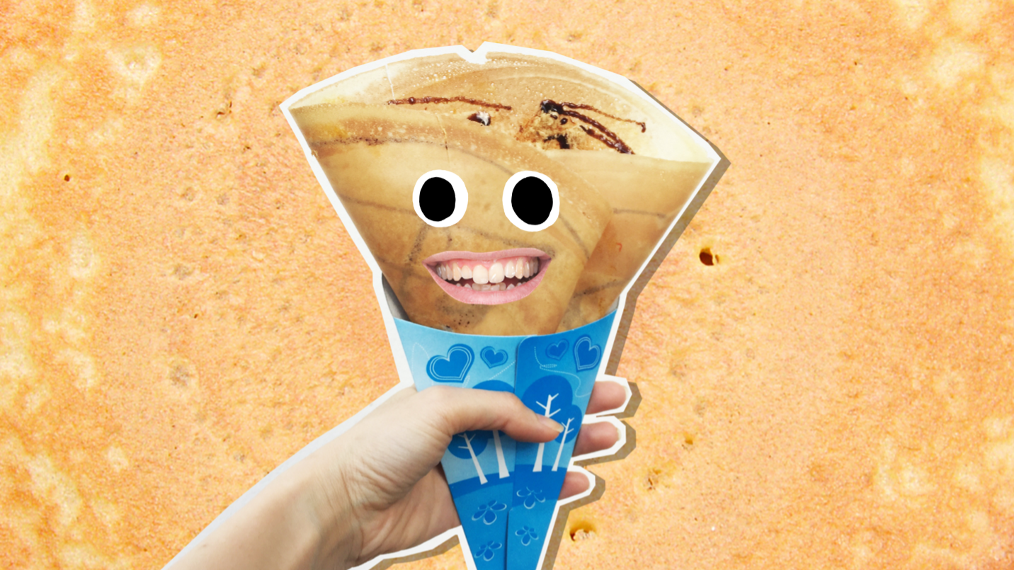 A folded crêpe with a cheerful face